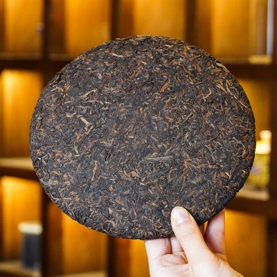 陈年冰岛贡茶357g昆明干仓茶普洱熟茶金芽贡饼云南七子饼大叶种古图4